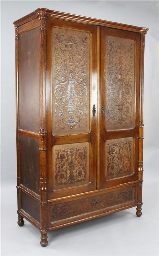 A 19th century French walnut armoire, W.3ft 10in. D.1ft 10in. H.6ft 1in.
